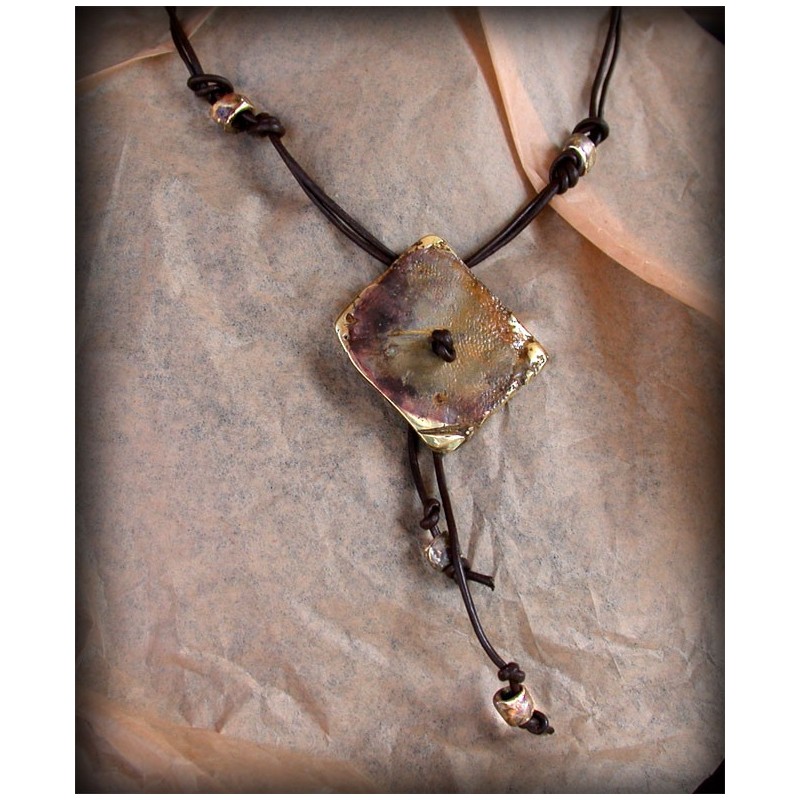 TXE395n Lost Wax Cast Earth Brass Textured Pendant on rich brown genuine rawhide w/brass beading TXE395n Lost Wax Cast Earth Brass Textured Pendant on rich brown genuine rawhide w/brass beading